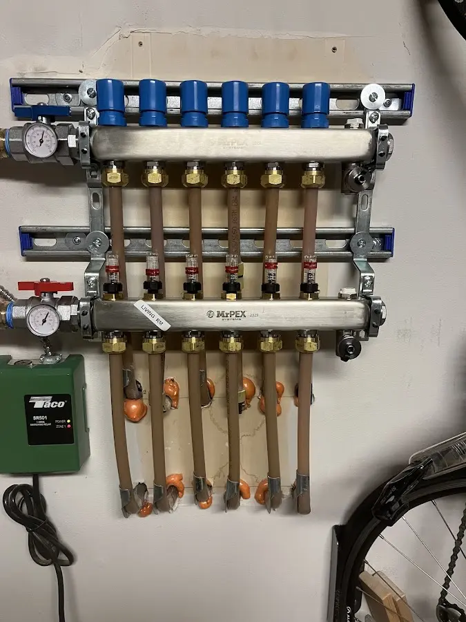 Plumber performing Water Heater Repair at a residential property in Arbutus